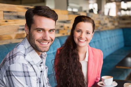 Cute couple on a date at the cafeの写真素材