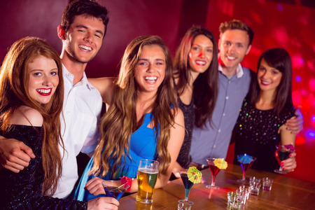 Happy friends on a night out together at the nightclub