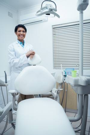 Portrait of smiling young female dentistの写真素材