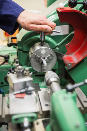 Engineering student using heavy machinery at the universityの写真素材