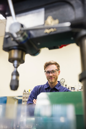 Engineering student smiling at camera at the university