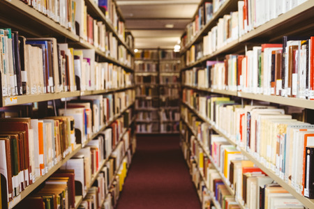 Close up of a bookshelf in libraryの写真素材