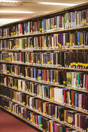 Close up of a bookshelf in libraryの写真素材