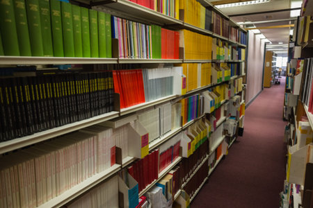 Rows of bookshelves in the library at the universityのeditorial素材