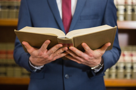 Lawyer standing in the law library at the university
