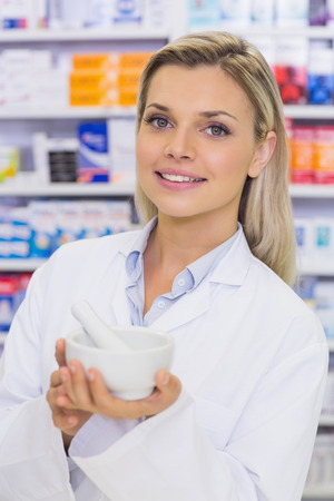 Pharmacist mixing a medicine at the hospital pharmacyの写真素材