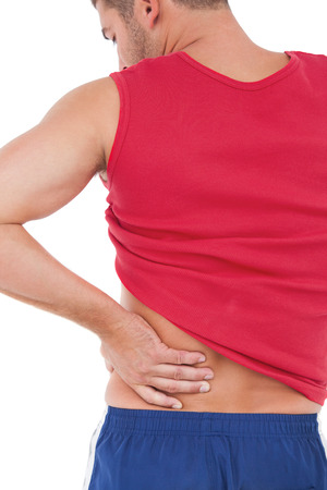 Fit man with injured back on white backgroundの写真素材
