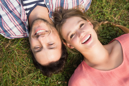 Cute couple in the park on a sunny dayの写真素材