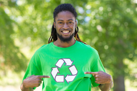 Happy environmental activist in the park on a sunny dayの写真素材