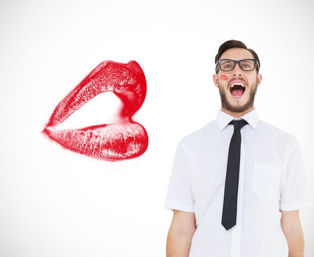 Geeky young businessman shouting loudly against white background with vignetteの写真素材