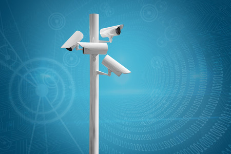 CCTV camera against spiral of shiny binary codeの写真素材