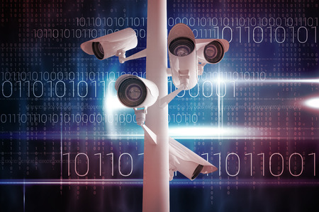 CCTV camera against blue technology design with binary code