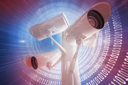 CCTV camera against glowing futuristic binary code spiral