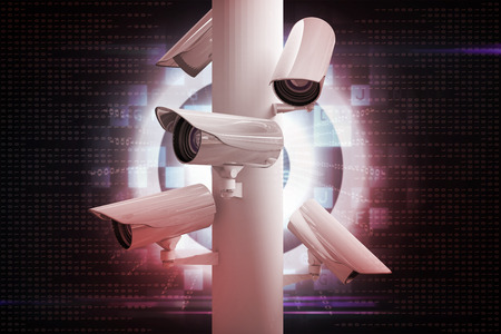 CCTV camera against digital target over computing designの写真素材