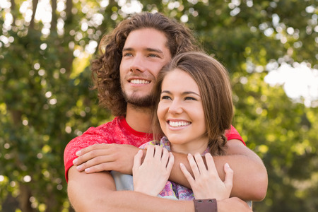 Cute couple in the park on a sunny dayの写真素材