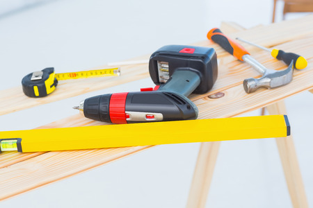 Construction tools on workbench at site