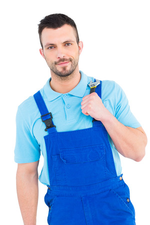 Repairman holding adjustable wrench on white backgroundの写真素材