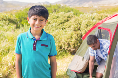 Father and son in the countryside on a sunny dayの写真素材