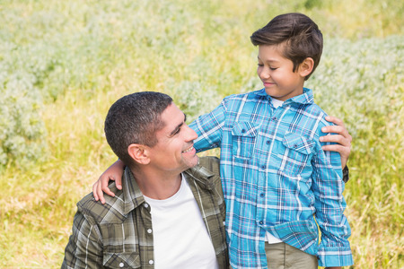 Father and son in the countryside on a sunny dayの写真素材