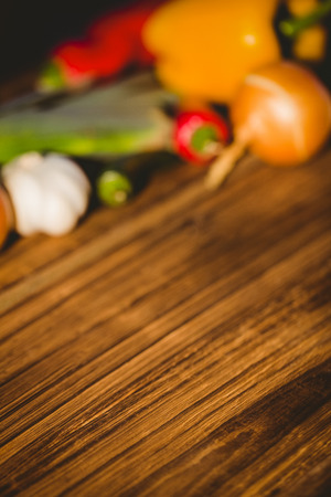 Vegetables laid out on table shot in studioの写真素材