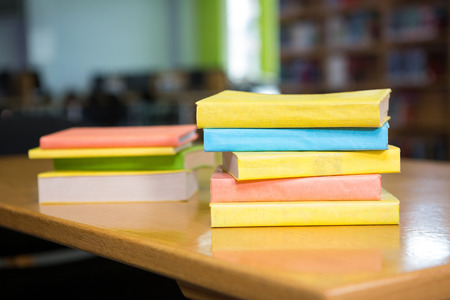 Stack of books in library at the university