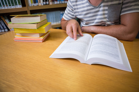 Student studying in the library at the university