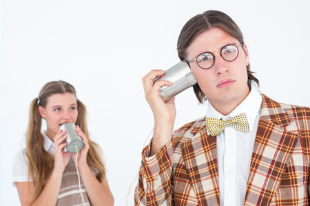 Geeky hipsters using string phone on white background