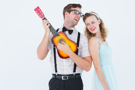 Hipster couple having fun together on white backgroundの写真素材