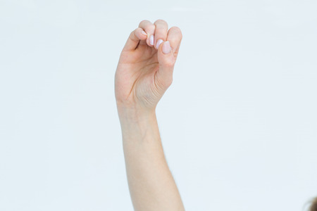 Hand presenting on white backgroundの写真素材