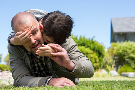 Father and son having fun in the countrysideの写真素材
