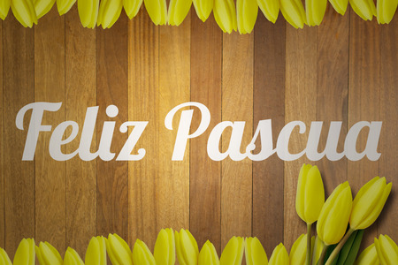 feliz pasqua against wooden surface with planks