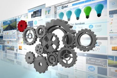 Cogs and wheels against screen collage showing business advertisement