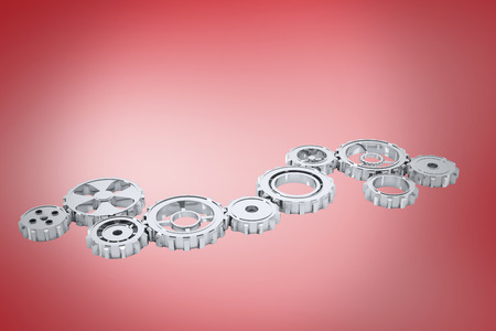 cogs and wheels against red vignetteの写真素材