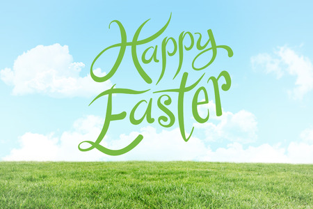 happy easter against field and skyの写真素材