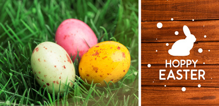 happy easter graphic against overhead of wooden planksの写真素材