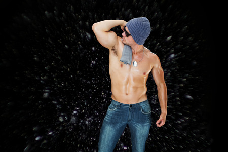 Attractive bodybuilder against black backgroundの写真素材