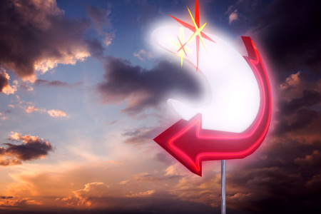 Neon sign against blue and orange sky with clouds