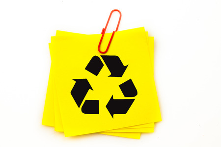 Recycling symbol against sticky note with red paperclipの写真素材