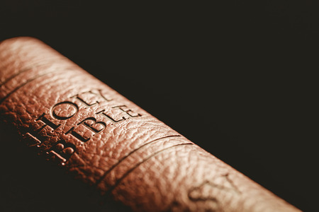 Close up of bible in the shadowの写真素材