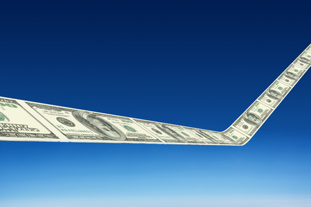 Dollar road against blue sky