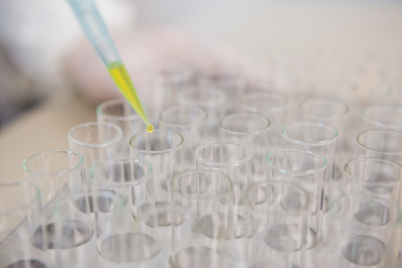 Scientist injecting tubes in the laboratory