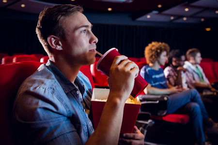People watching a film at the cinemaの写真素材