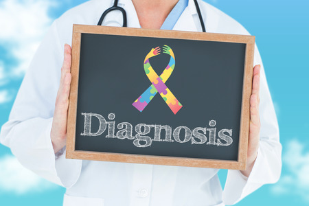 The word diagnosis and doctor showing chalkboard against blue skyの写真素材