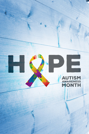 autism awareness month against bleached wooden planks backgroundの写真素材