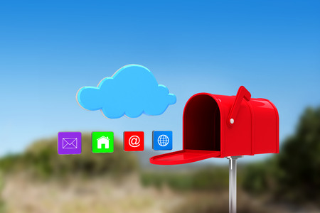Red email postbox against mountain trail