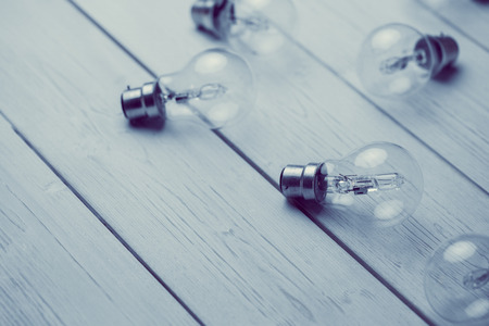 Light bulbs on wooden tableの写真素材