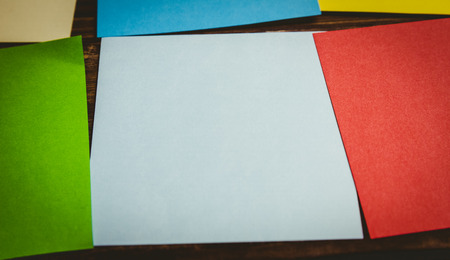 Colorful sticky post its on wooden backgroundの写真素材