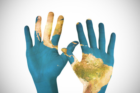 Hands against white background with vignetteの写真素材