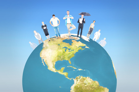 People standing on earth against bright blue skyの写真素材