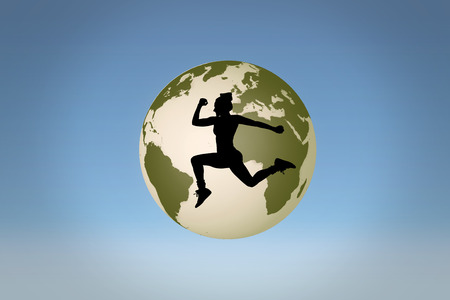 Fit woman silhouette against blue skyの写真素材